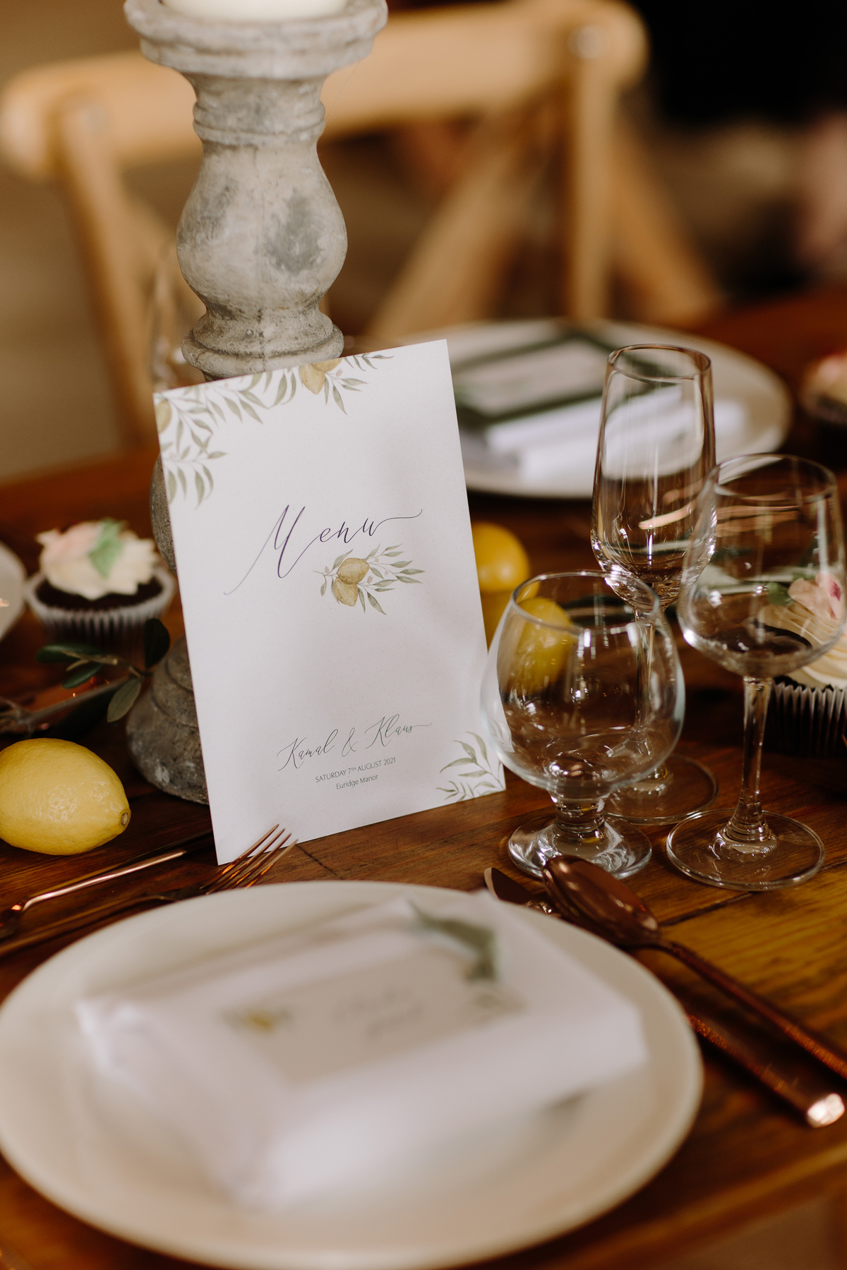 Vegan wedding stationery. Vegan wedding menu printed with plant-based vegan ink. Sat on wedding stable with tuscany style lemon and vines