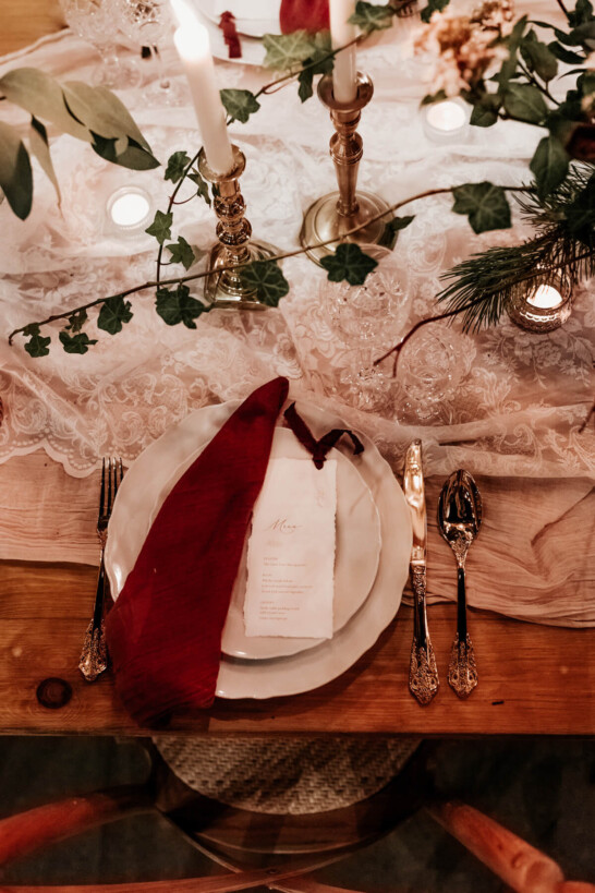 simple elegant wedding invites Plum and recycled paper wedding menu with plum silk ribbon at Sneaton Castle whitby