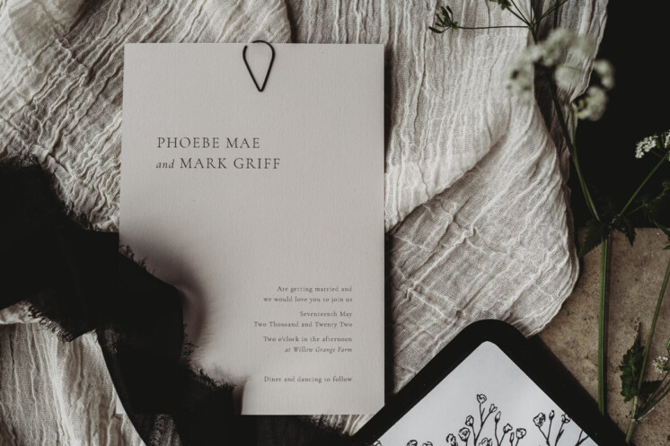 Elegant wedding invitations. Simple elegant typographic minimal wedding invitation on stone recycled paper