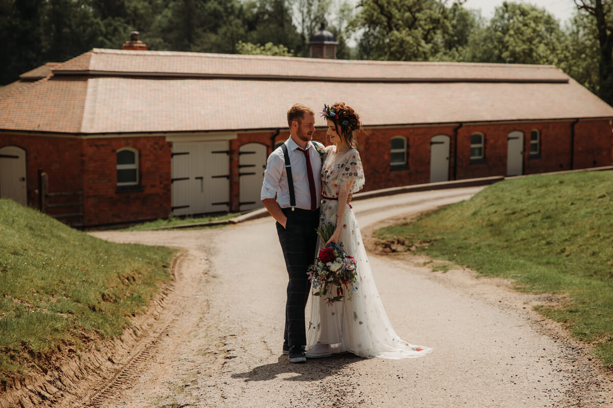 The Hall Barns Prestwold wedding venue with bride and groom