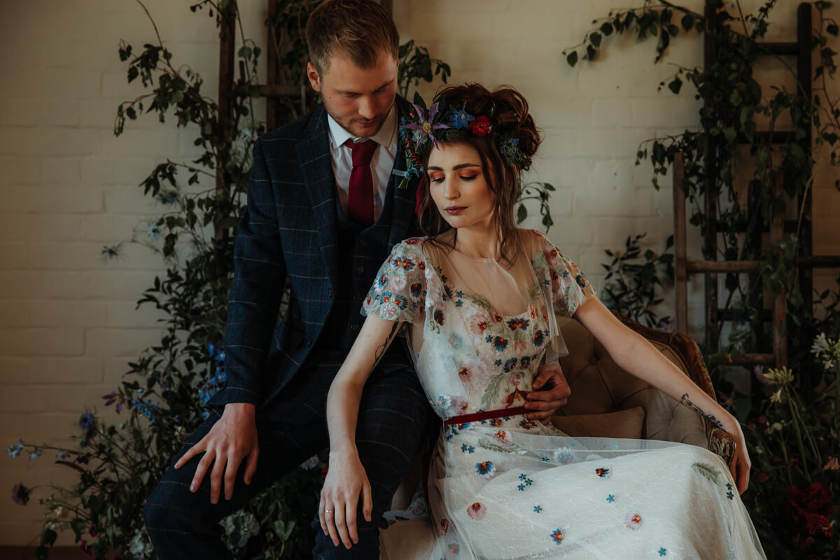 Bride and groom. Bride in embroidered floral wedding dress