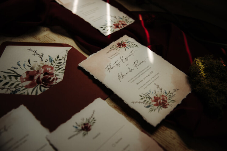 watercolour floral plum wedding invitation with plum envelope