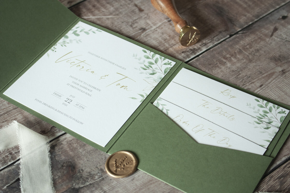 Eucalyptus wedding invite in vintage green wallet with gold wax seal