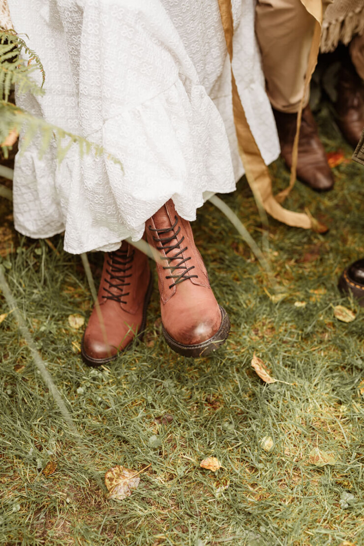 Bride in brown boots for Autumn wedding