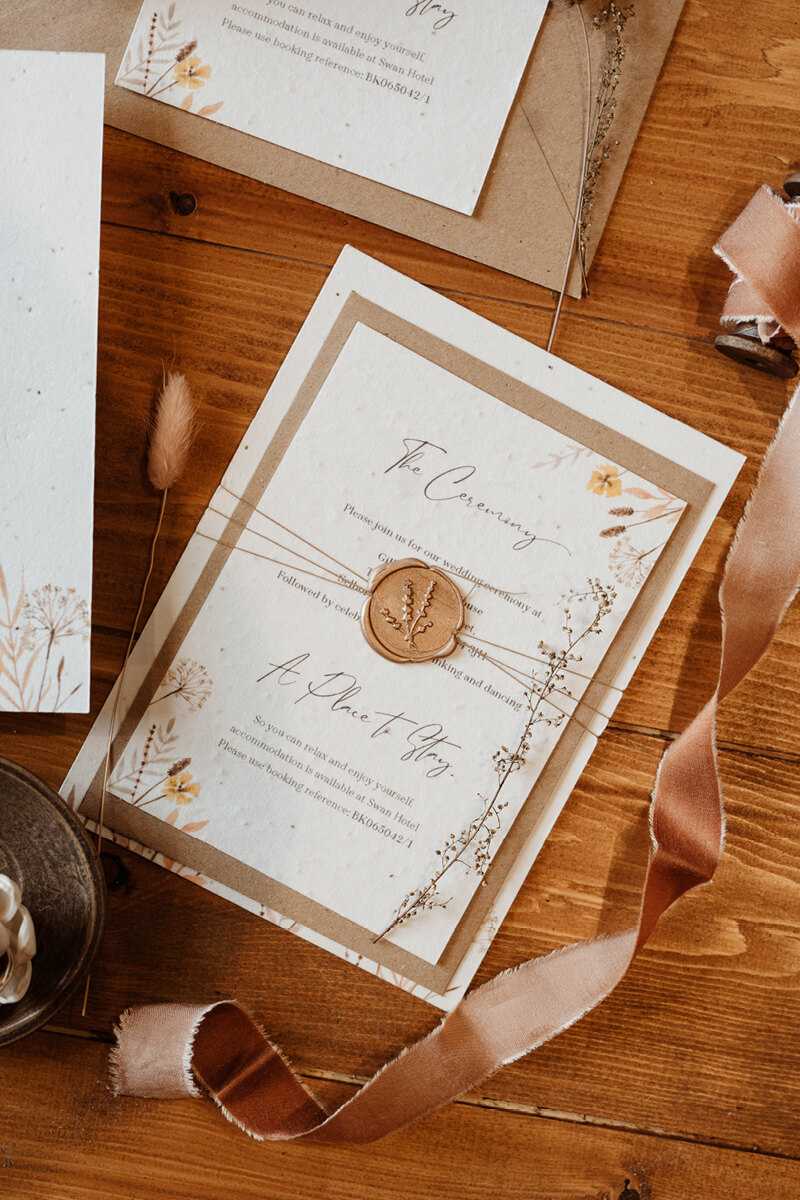 Autumn wedding invite on seeded paper