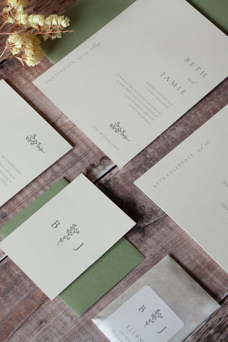 Flecked recycled paper wedding invite