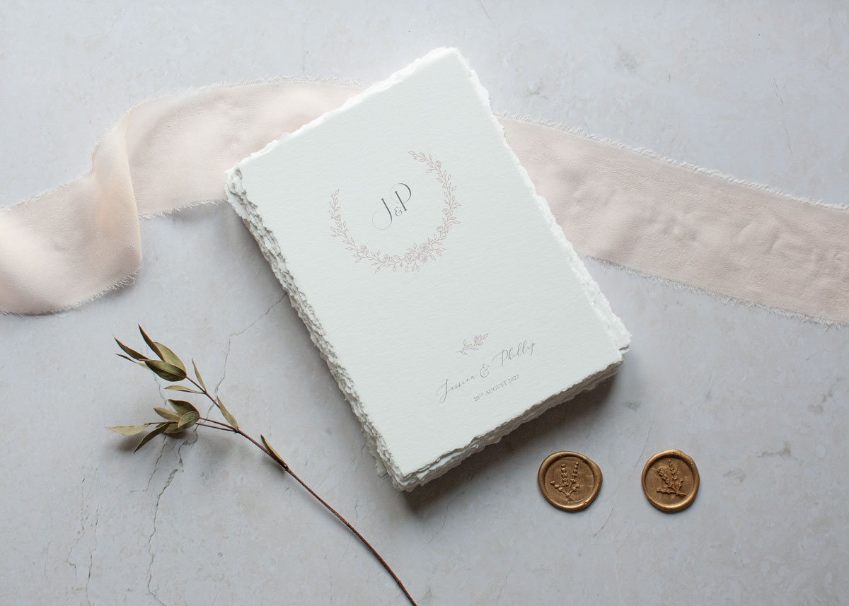 Line drawn couple monogram and floral rose wreath