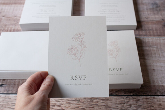 Ellie and Liv bespoke rose wedding invitation printed on pale grey card