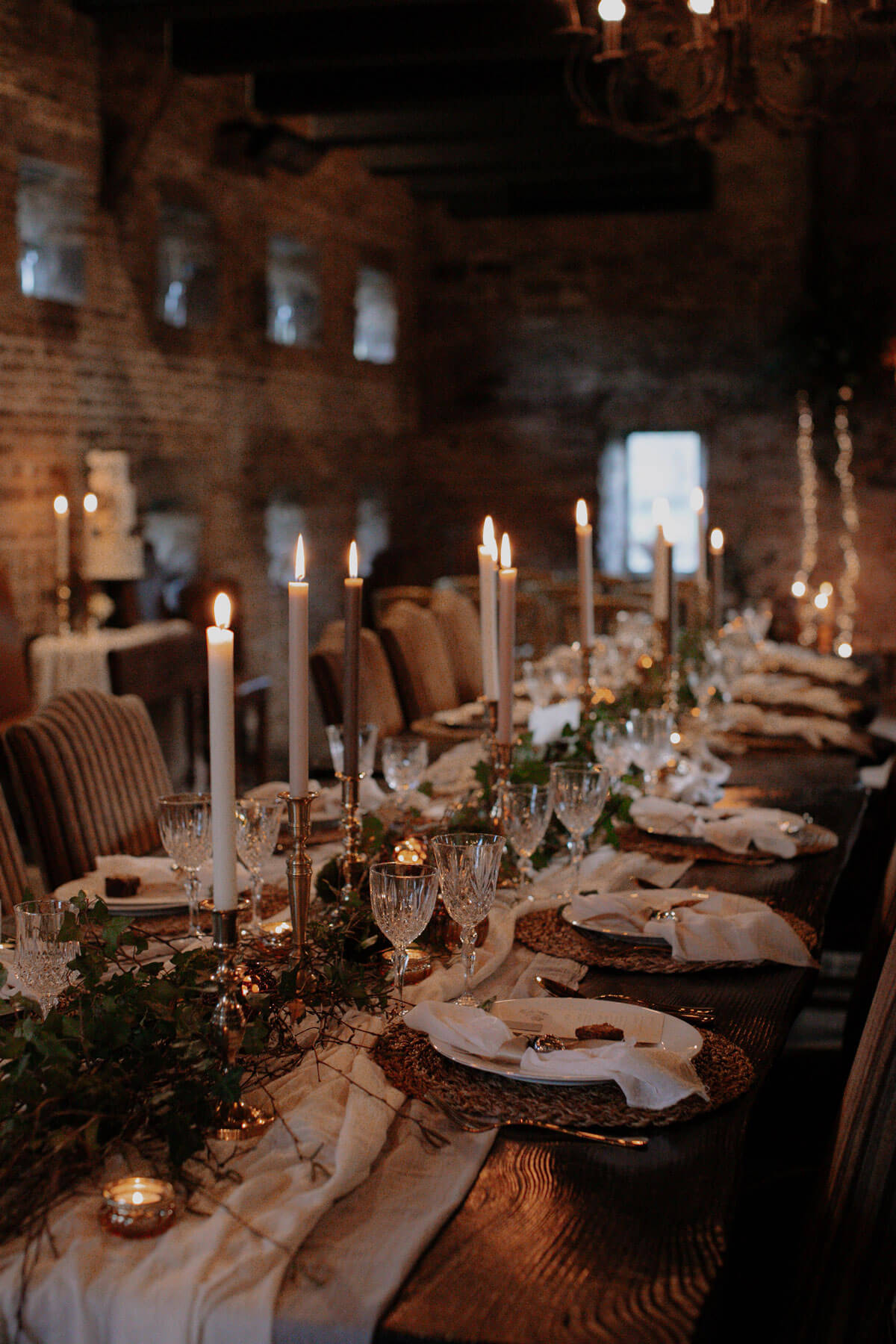 Cosy winter wedding table at Barlow Woodseats Hall with candle light