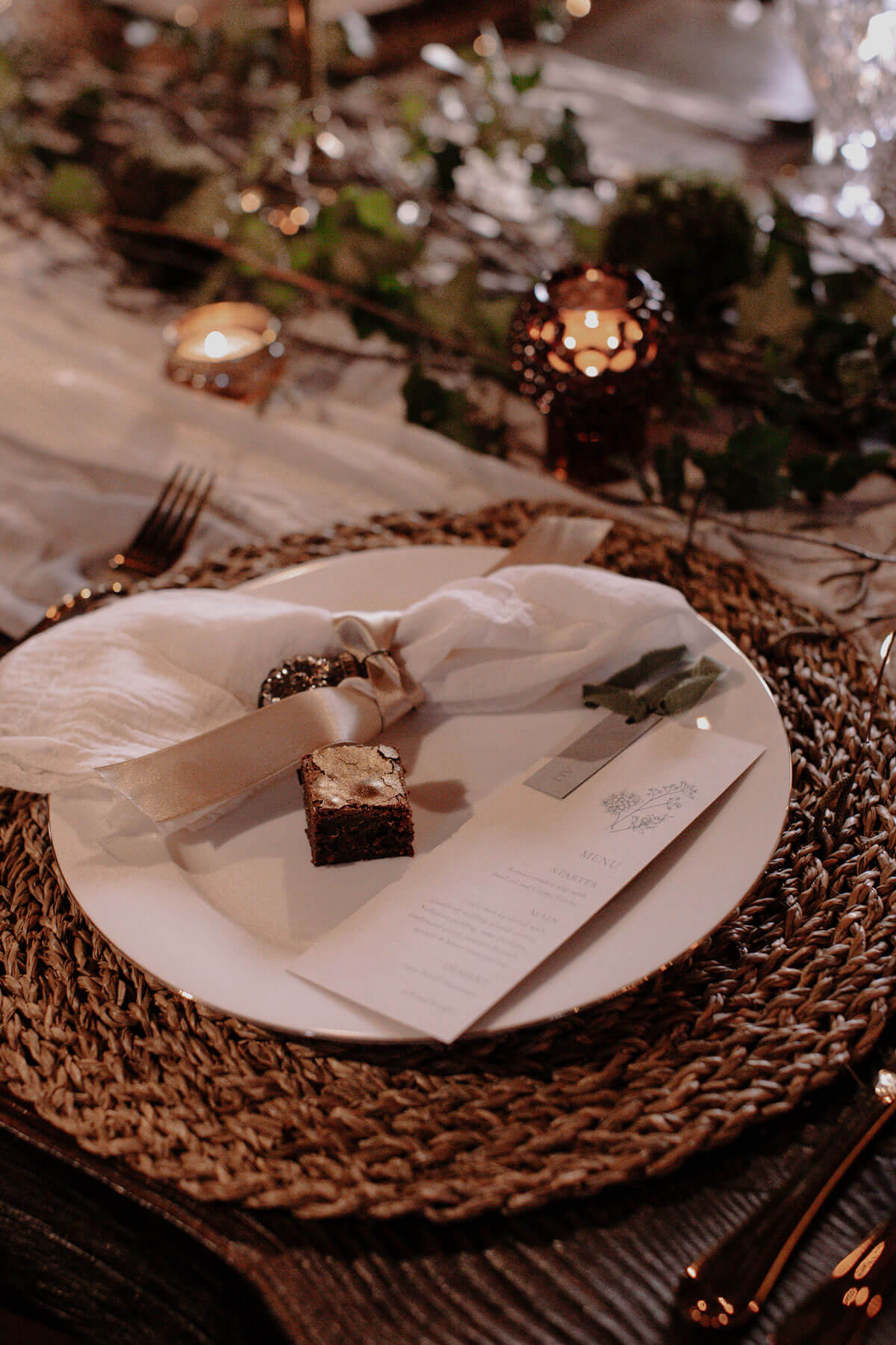 Petite wedding menu with place name. Pale grey and earthy sage green botanical details for a winter wedding