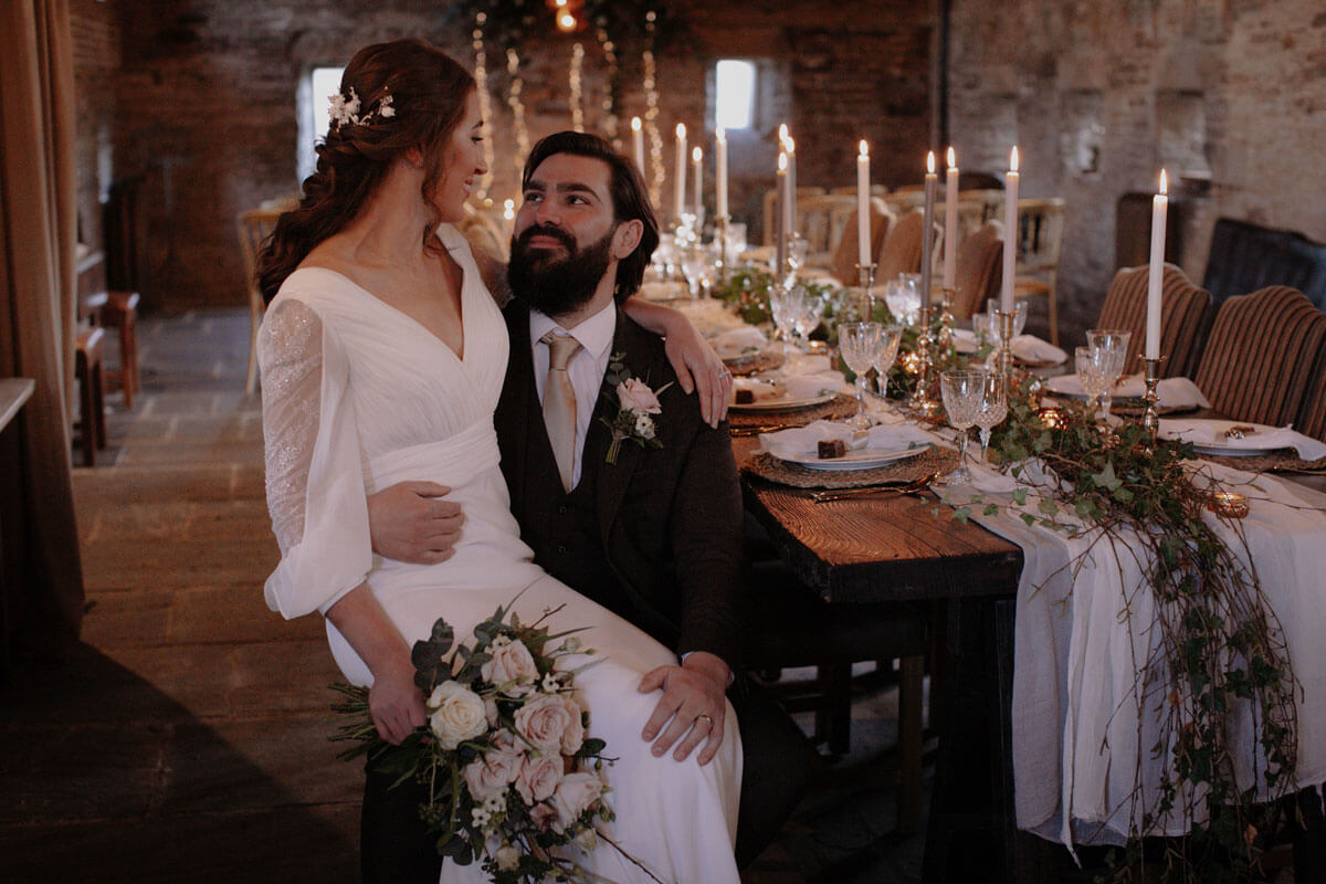 Ellie and Liv bride and groom at cosy winter wedding