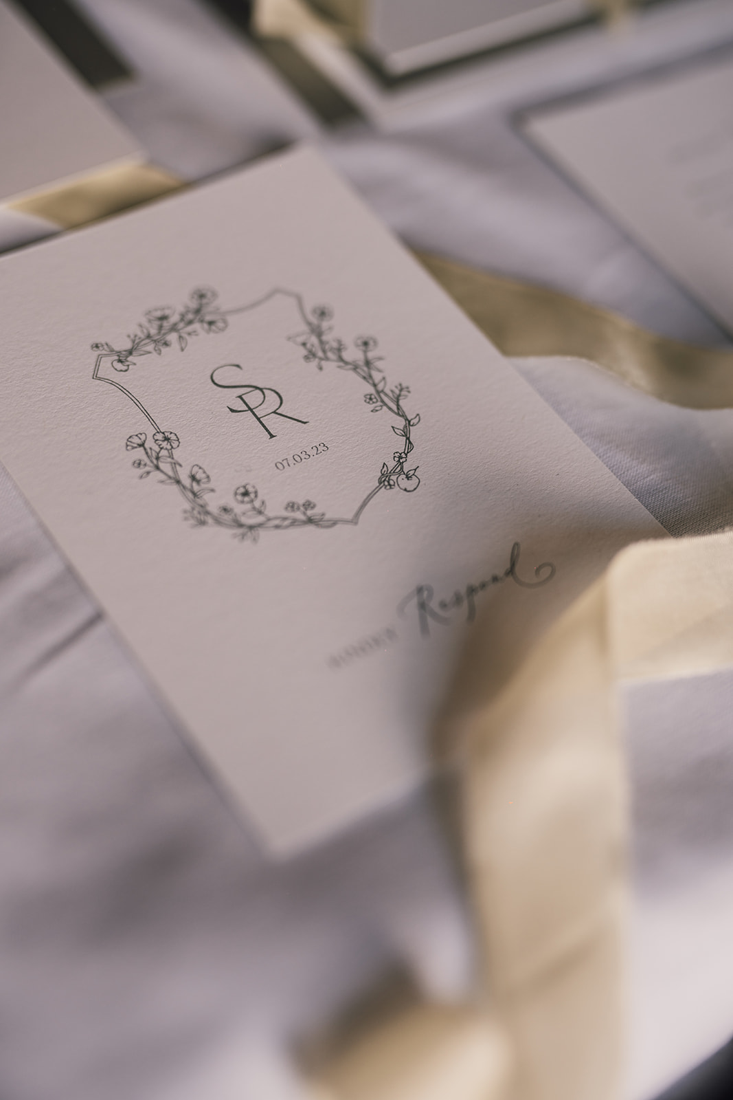 Storytelling wedding invite. Wedding couple shield with bespoke details.